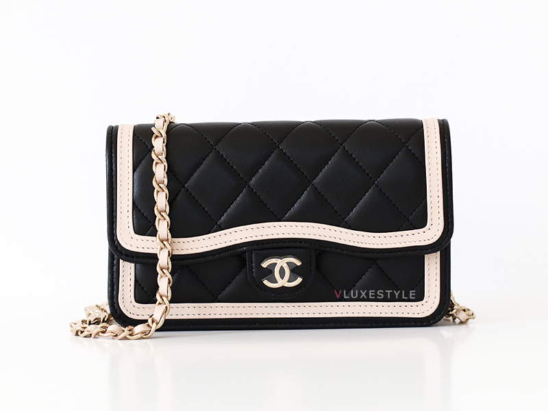 The Chanel 23B Flap Phone Holder with chain